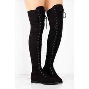 Black, thigh high boots
